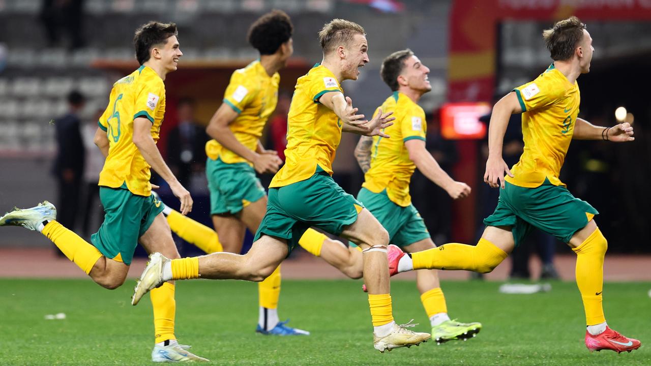 The Australians celebrate the victory after the penalty shootout. Picture: Zhizhao Wu/Getty Images