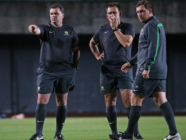 Peter Cklamovski, right, oversees Socceroos training alongside then coach Ange Postecoglou, left, and keeper coach Tony Franken, centre, ahead of the 2014 World Cup. Picture: George Salpigtidis