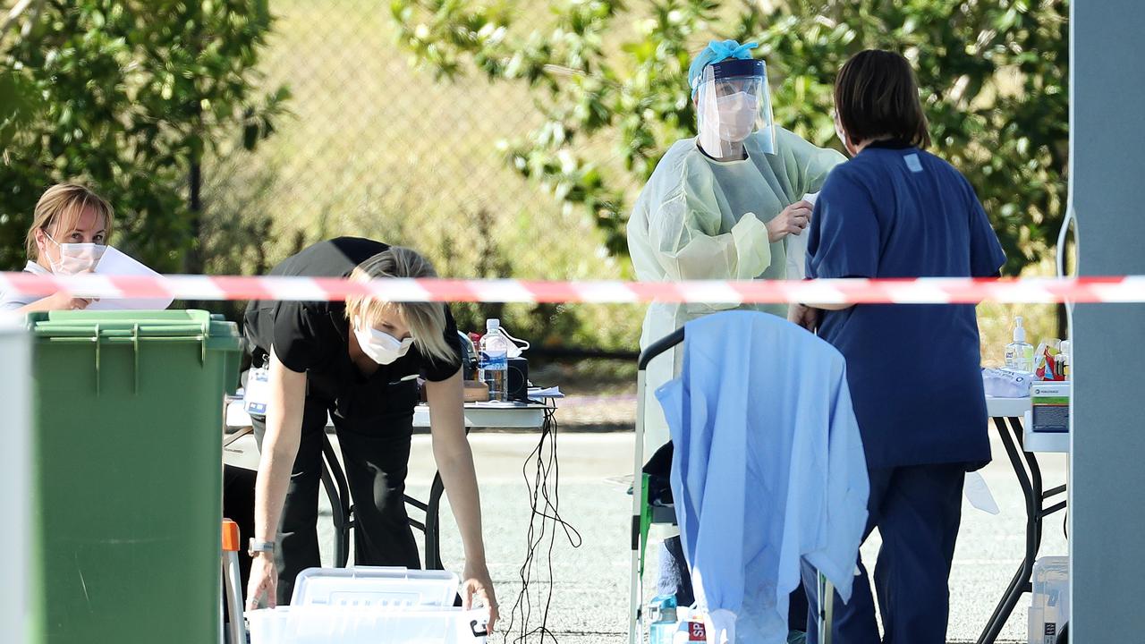 Health workers at the Mater Private Hospital testing clinic in Springfield. Picture: Liam Kidston