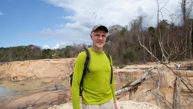 Dominic Phillips at a mine in site in Roraima State, Brazil. - Brazil's Federal Police said on June 17, 2022 it had officially identified the remains of British journalist Dom Phillips, who was found buried in the Amazon after going missing on a book research trip. (Photo by Joao LAET / AFP)