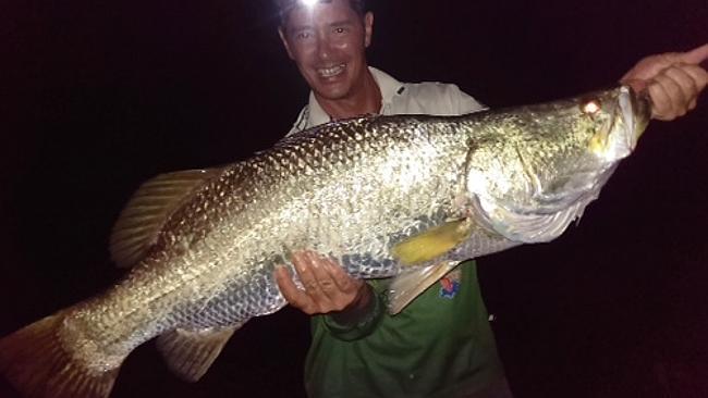 Mykey Cambell shows off the metery barra he snagged at Shady Camp.