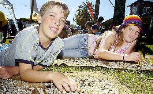 Fossickers: Kyle, 12 (left) and Aleriah, 10, Earl of Casino were on a treasure hunt searching for gems at the Lismore Gemfest on Saturday. Picture: Cathy Adams