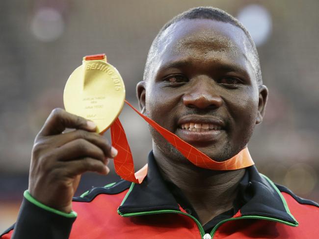 Kenya's Julius Yego celebrates on the podium at the World Athletics Championships