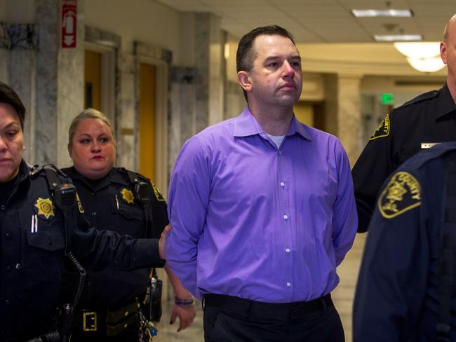 Joseph McEnroe is led into court. Picture: AP