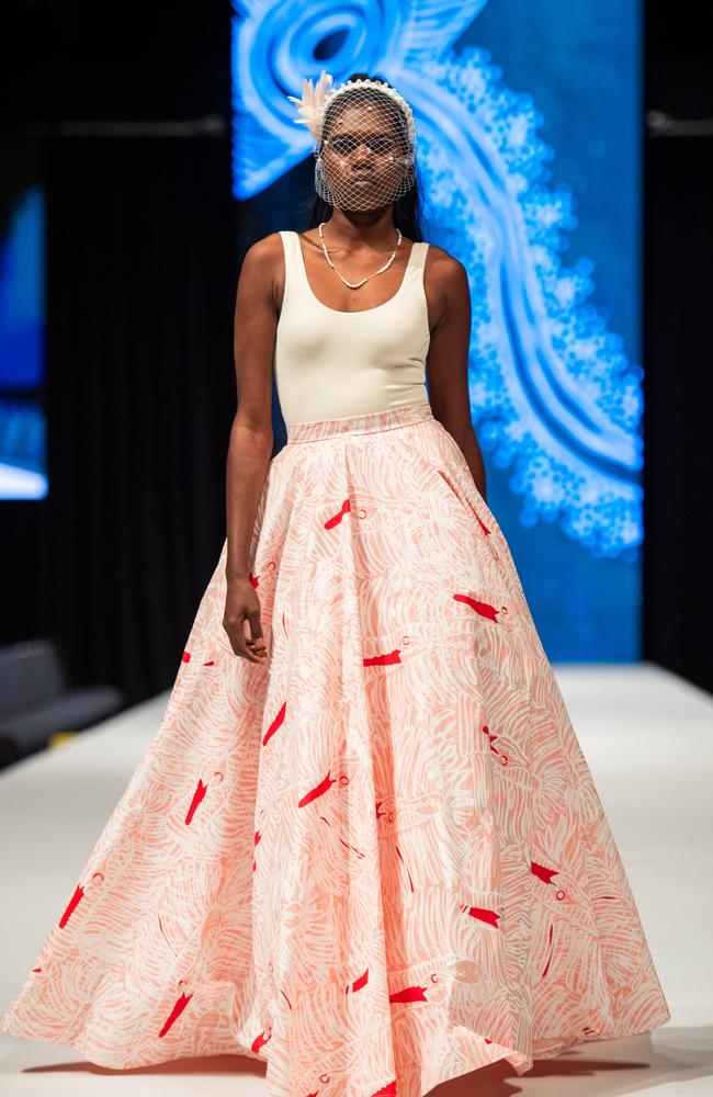 Hayley Mulardy at the 2024 Country to Couture at the Darwin Convention Centre showcases hand-designed First Nations fashion. Picture: Pema Tamang Pakhrin