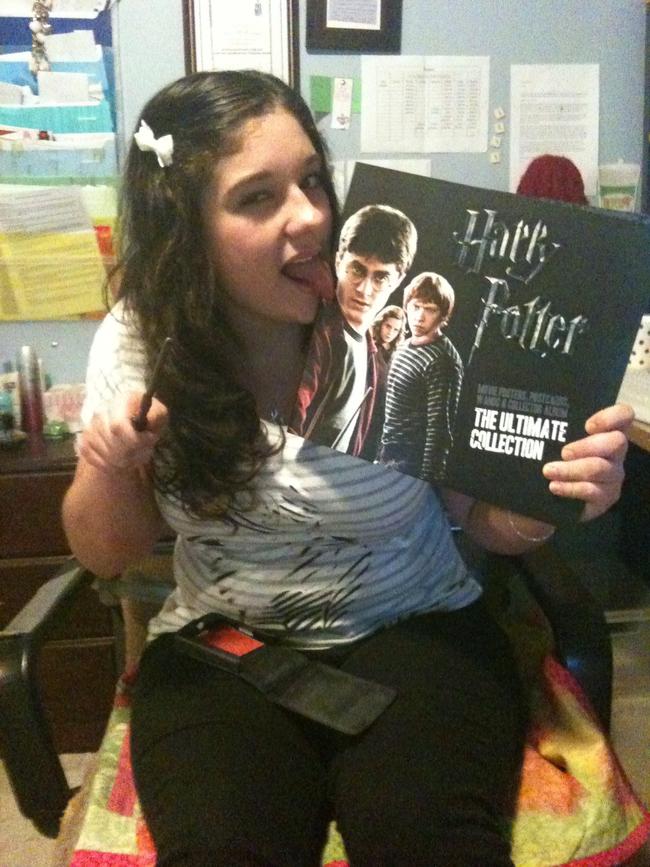 Jess, pictured with News Limited’s Harry Potter collection, was a bonafide Potterhead. Picture: Supplied