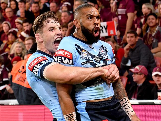 BRISBANE, AUSTRALIA - JUNE 27: Josh Addo-Carr of the Blues celebrates with team mate Cameron Murray after scoring a try during game two of the 2021 State of Origin series between the Queensland Maroons and the New South Wales Blues at Suncorp Stadium on June 27, 2021 in Brisbane, Australia. (Photo by Bradley Kanaris/Getty Images)