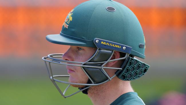 Australia captain Steve Smith plays with a neck guard.