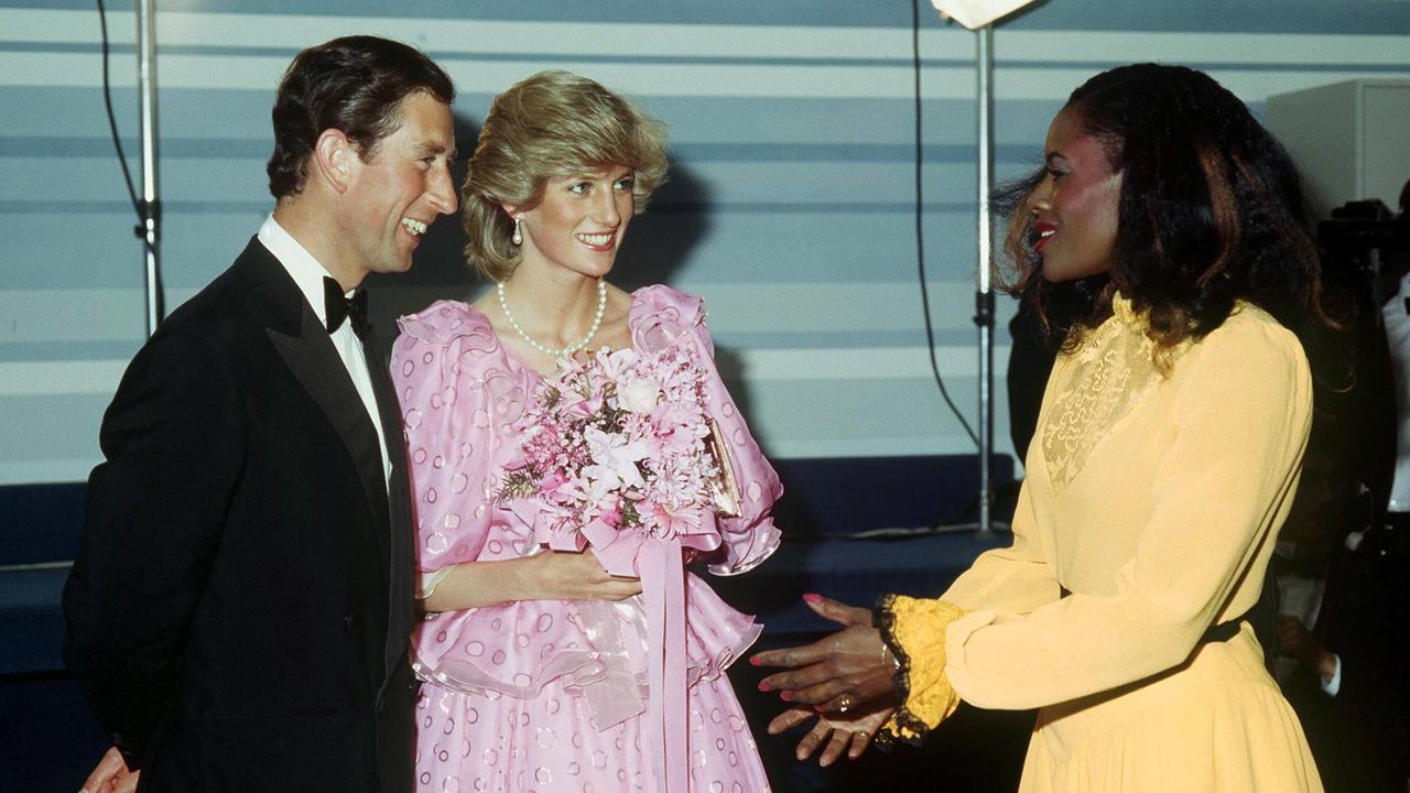 Prince Charles and Princess Diana meet Australian singer, Marcia Hines after the 1983 Melbourne Concert Hall show.