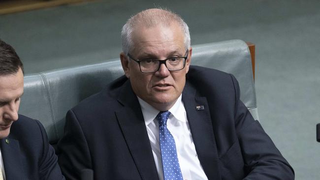 CANBERRA, AUSTRALIA - NewsWire Photos NOVEMBER 29, 2022: Alex Hawke with former PM Scott Morrison during Question Time in the House of Representatives in Parliament House in Canberra.Picture: NCA NewsWire / Gary Ramage