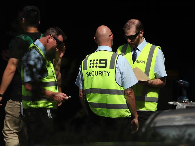 Nine Network security guards following the police raid of A Current Affair’s office. Picture: Phil Hillyard