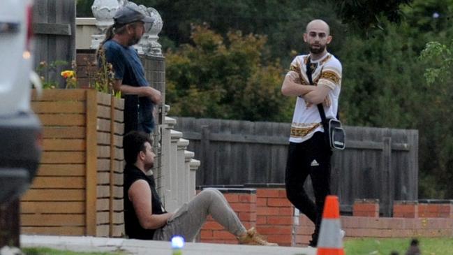 People at the scene of Mitat Rasimi’s death in Dandenong. Picture: Andrew Henshaw