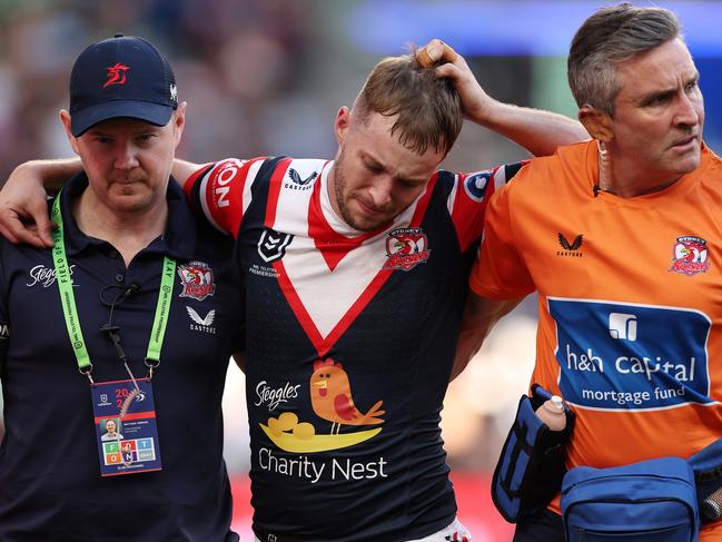 Sam Walker leaves the field with an ACL injury. Picture: Cameron Spencer/Getty Images