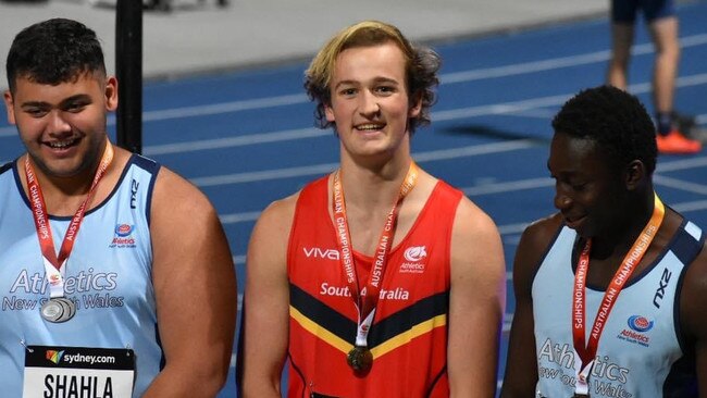 SA athlete Darcy Miller (centre) after winning the under-18 men's discus event at the 2021 National Athletics Championships. Picture Supplied