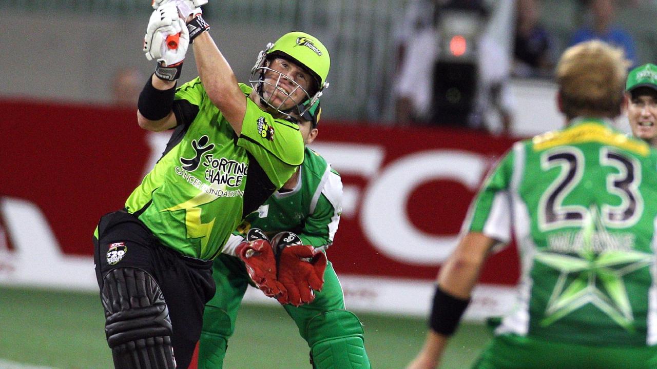 David Warner hits Shane Warne into the crowd for a six.