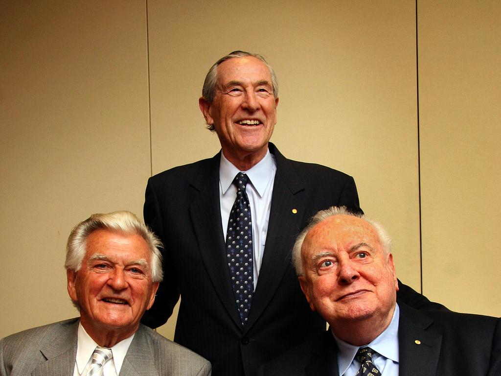 Former PM Bob Hawke (L) launches former ambassador Richard Woolcott's (C) book, 'Undiplomatic Activities', with former PM Gough Whitlam present in Sydney.