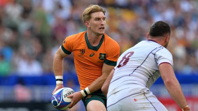 Tate McDermott (L) during the France 2023 Rugby World Cup Pool C match between Australia and Georgia on September 9, 2023. (Photo by Miguel MEDINA / AFP)