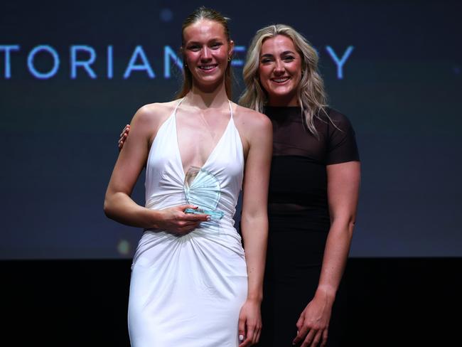 Emily Andrew (L) poses after receiving the Australian Netball Championships Player of the Year award. Picture: Getty Images