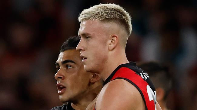 MELBOURNE, AUSTRALIA - MARCH 27: Isaac Kako (left) and Nate Caddy of the Bombers celebrate during the 2025 AFL Round 03 match between the Essendon Bombers and the Port Adelaide Power at Marvel Stadium on March 27, 2025 in Melbourne, Australia. (Photo by Michael Willson/AFL Photos via Getty Images)