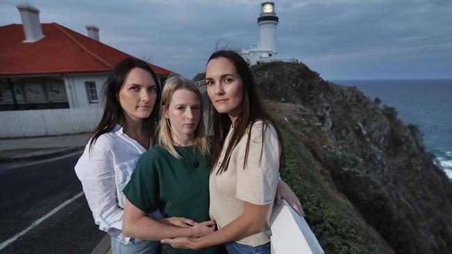 Sheri D'Rosario, centre, with twin sisters Jaclyn Scott, left, and Renee Scott. Picture Lyndon Mechielsen