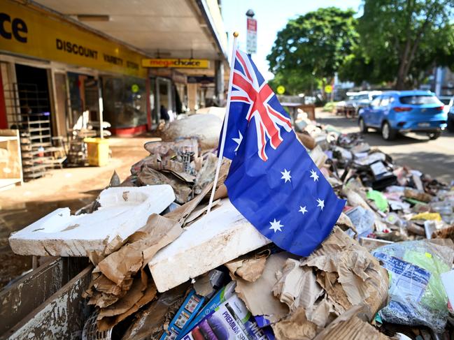 LISMORE, AUSTRALIA - MARCH 04: Piles of flood-damaged goods line a main street on March 04, 2022 in central Lismore, Australia.  Residents are returning to their properties to survey the damage following unprecedented storms and the worst flooding in a decade.  (Photo by Dan Peled/Getty Images)