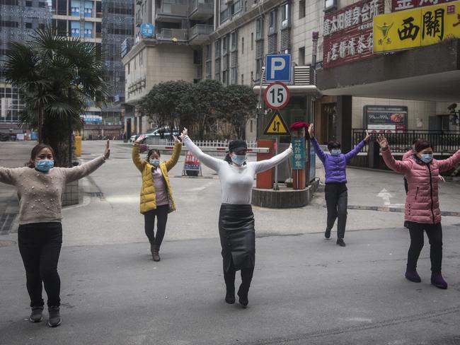 A group of women exercising in Wuhan, China. Picture: Getty