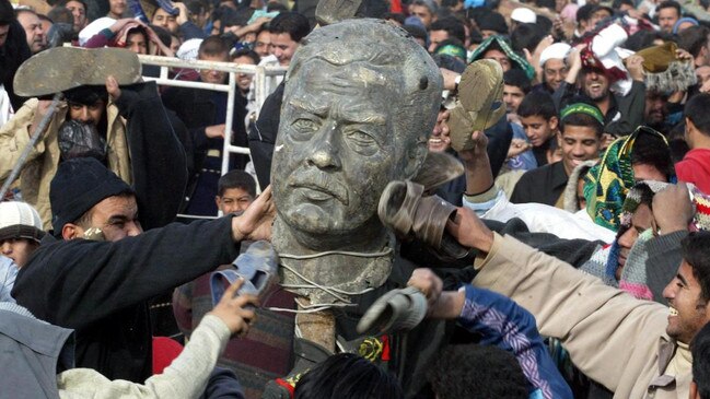 Iraqis take out their anger in Sadr City. Picture: EPA/The Times