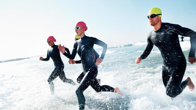 A group of athletes competing in a triathlon