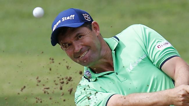 Padraig Harrington was struck in the elbow by an amatuer playing he was coaching.