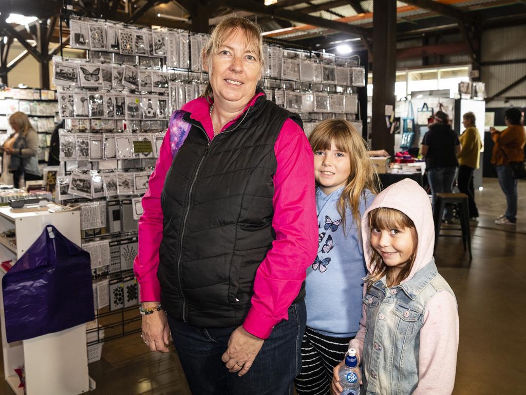 Christine Apted with daughters Maddie and Jessie (right) at Craft Alive at the Goods Shed, Sunday, May 22, 2022. Picture: Kevin Farmer