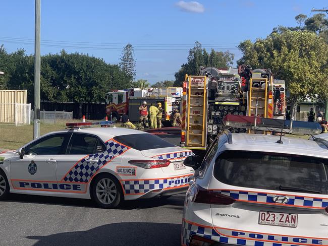 Emergency services at the scene of a house fire on Fisher Street.