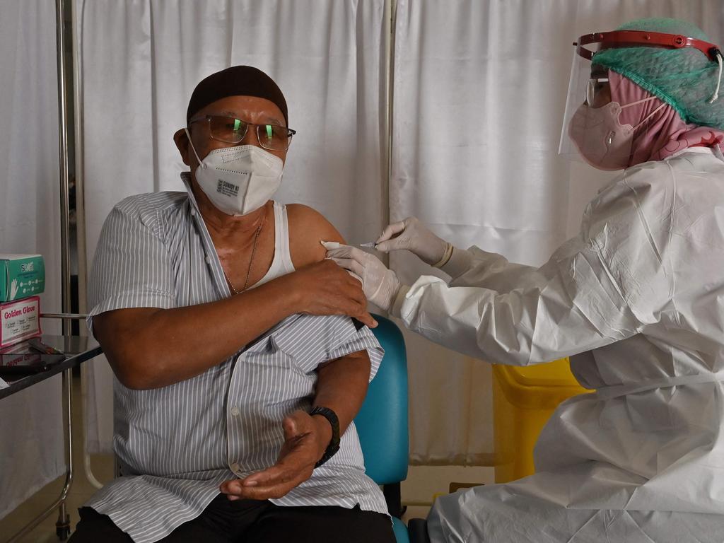 A man receives a booster dose of the Pfizer Covid-19 vaccine in Jakarta. Picture: AFP