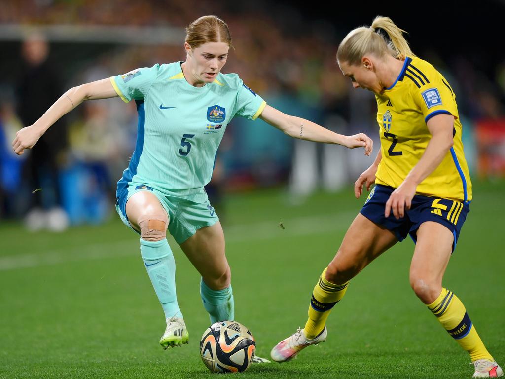 Cortnee Vine and Sweden’s Jonna Andersson compete for the ball during the playoff for third place at Brisbane Stadium on August 19. Picture: Justin Setterfield/Getty Images