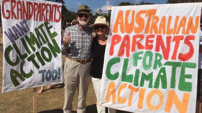 Des Ritchie, with his partner Jillian Rossiter, at a recent rally demanding government action on climate change.