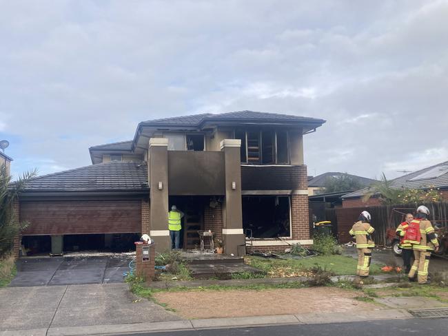 Five people, a man and four children, were injured in the fire. Picture: Angus McIntyre