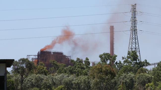 Red clouds billow from a damaged roaster at the Queensland Nickel refinery in Yabulu. Picture: Cameron Laird