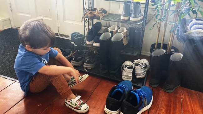 Teaching a Child How to Take Off and Put On Shoes