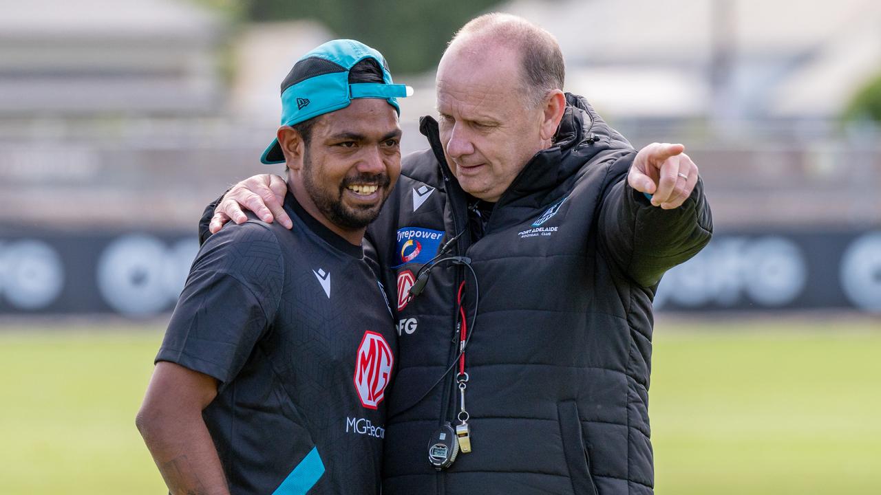 Junior Rioli with coach Ken Hinkley at Port pre-season training. Picture: Naomi Jellicoe