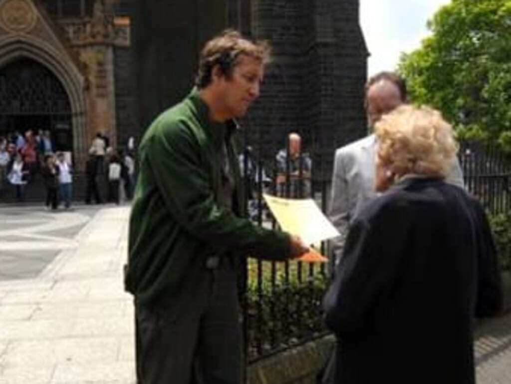 Mark Fabbro campaigning on behalf of survivors of sexual abuse outside Melbourne’s St Patrick's Cathedral where disgraced cardinal George Pell sexually assaulted two alter boys.