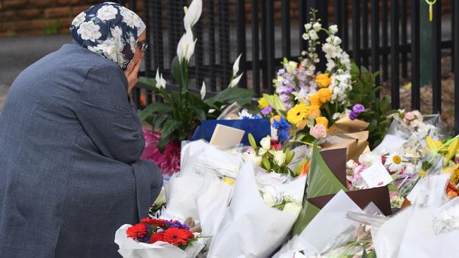 Children have returned to Banksia Road Public School in Greenacre today. Overnight wellwishers and locals placed flowers outside the school gates. Picture: AAP