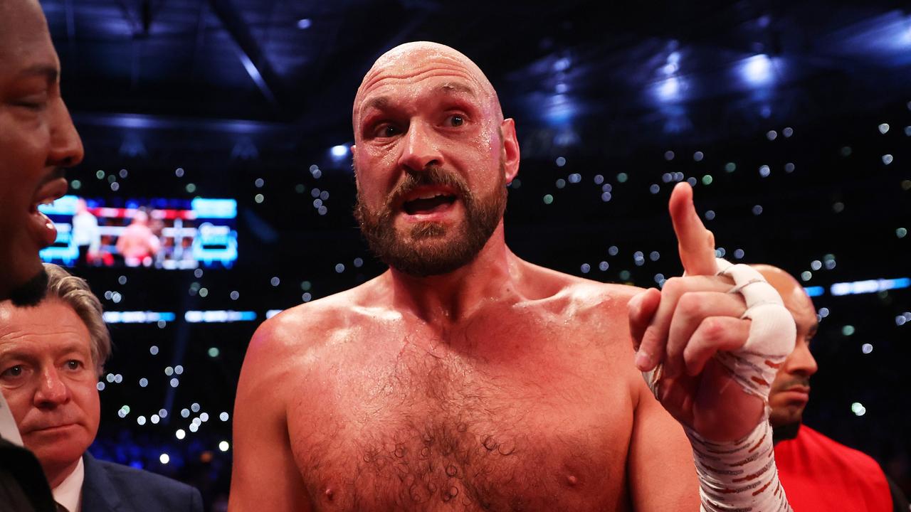 LONDON, ENGLAND - APRIL 23: Tyson Fury speaks to Dean Whyte after the WBC World Heavyweight Title Fight between Tyson Fury and Dillian Whyte at Wembley Stadium on April 23, 2022 in London, England. (Photo by Julian Finney/Getty Images)