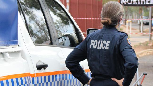 Police on the scene of an alleged aggravated assault on Gap Road in Alice Springs overnight which left an elderly man fighting for his life in hospital. October 4, 2022. Picture: Jason Walls