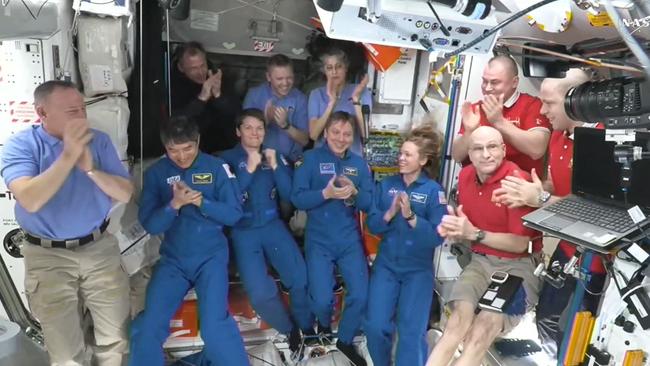 SpaceX Dragon members with the astronauts aboard the International Space Station. Picture: NASA / AFP