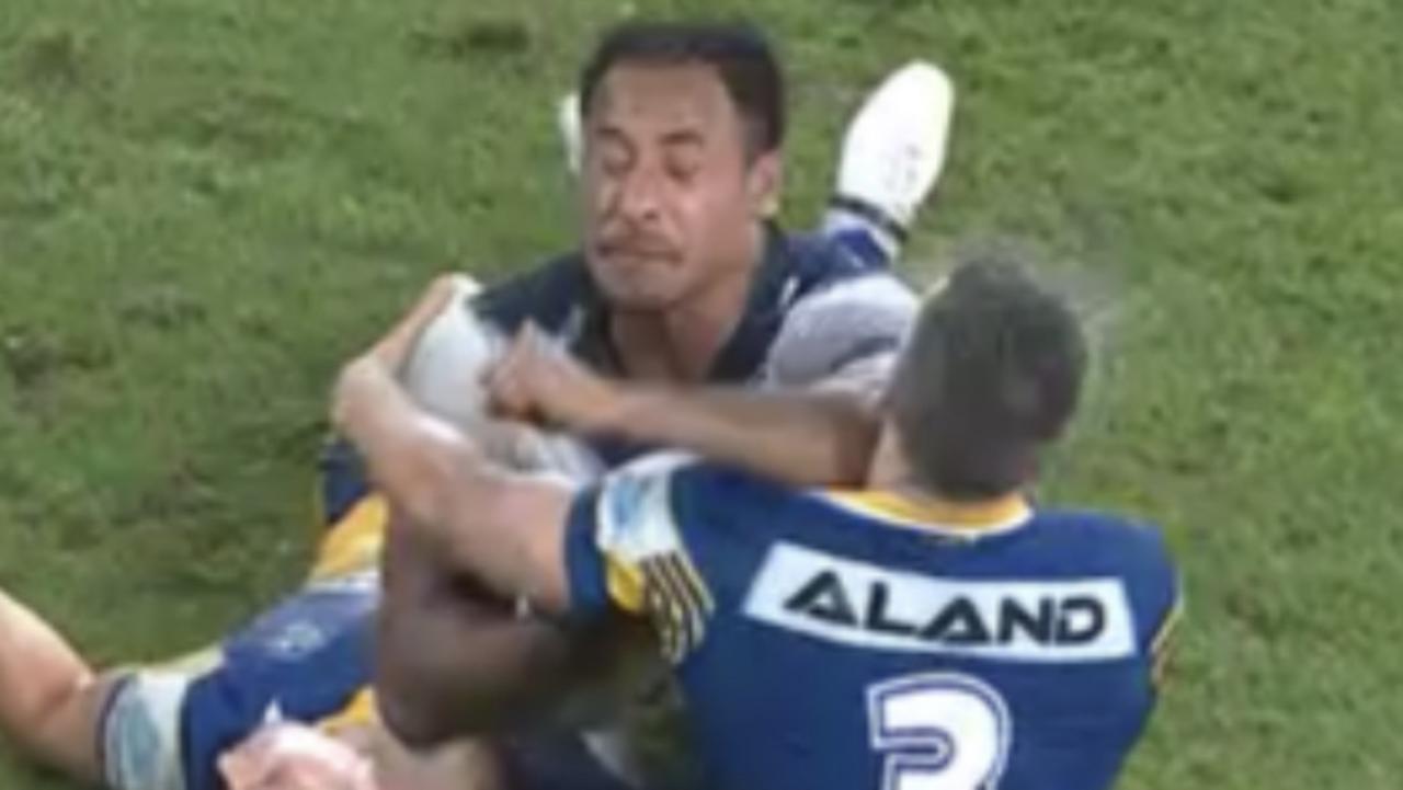 Felise Kaufusi makes contact with Eels centre Tom Opacic.