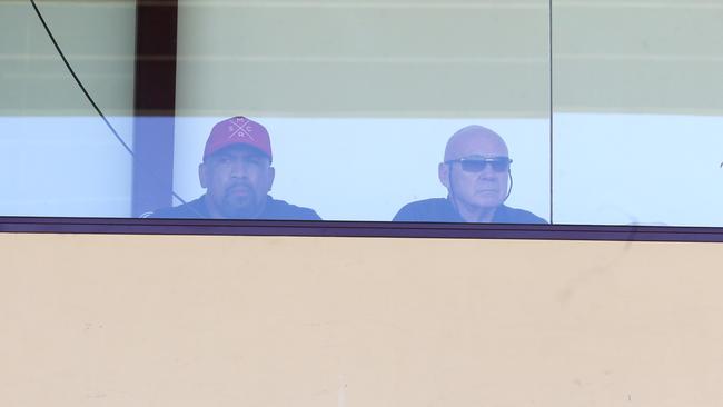 Pap pic of John Hopoate and Bob Fulton sitting in the coaches box at Brookvale Oval