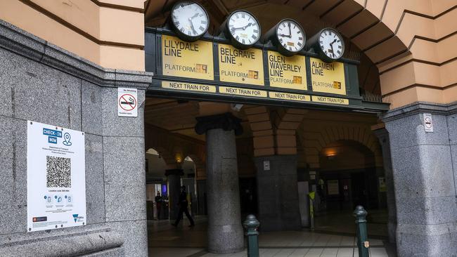 Victorians are required to check in to all public settings. Picture: Ian Currie