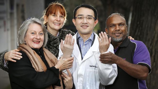 Dr Michael Wong with three of the five people who saved his life: (from left) Jo McIntyre, Rebecca Biron and Vinay Dass. Picture: David Caird.