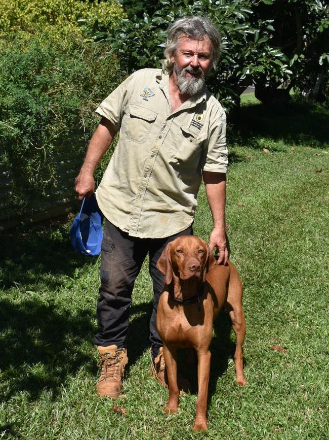 Alstonville farmer Mike Hogan with his dog Finn.