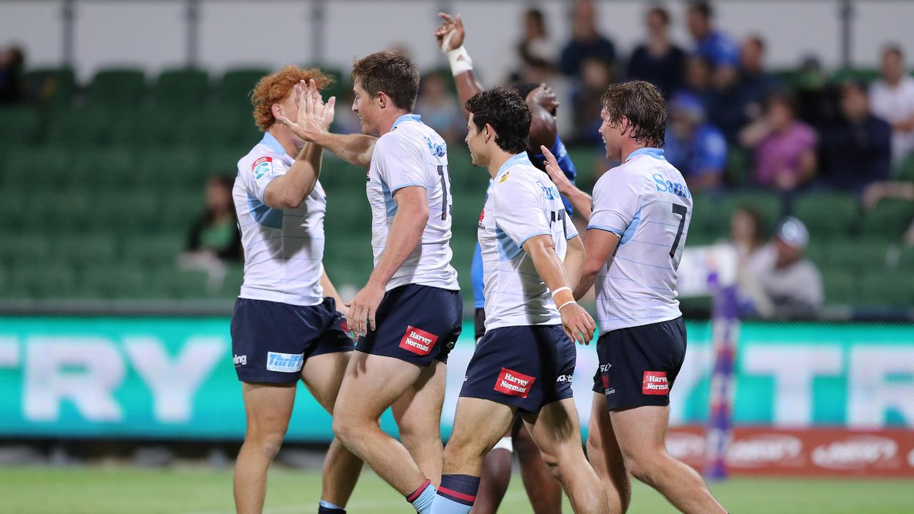 Waratahs players celebrate in Perth on Saturday night. Picture::Will Russell/Getty Images