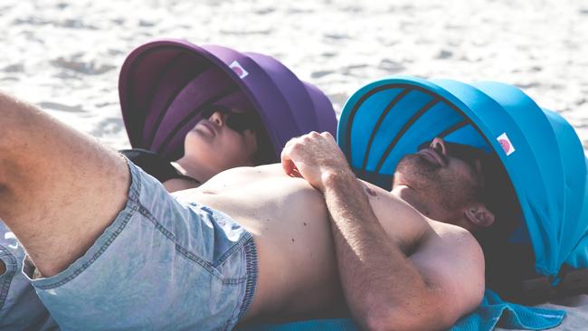 Mark Sellar and fiancee Melissa Kennedy model the Shader sun shade